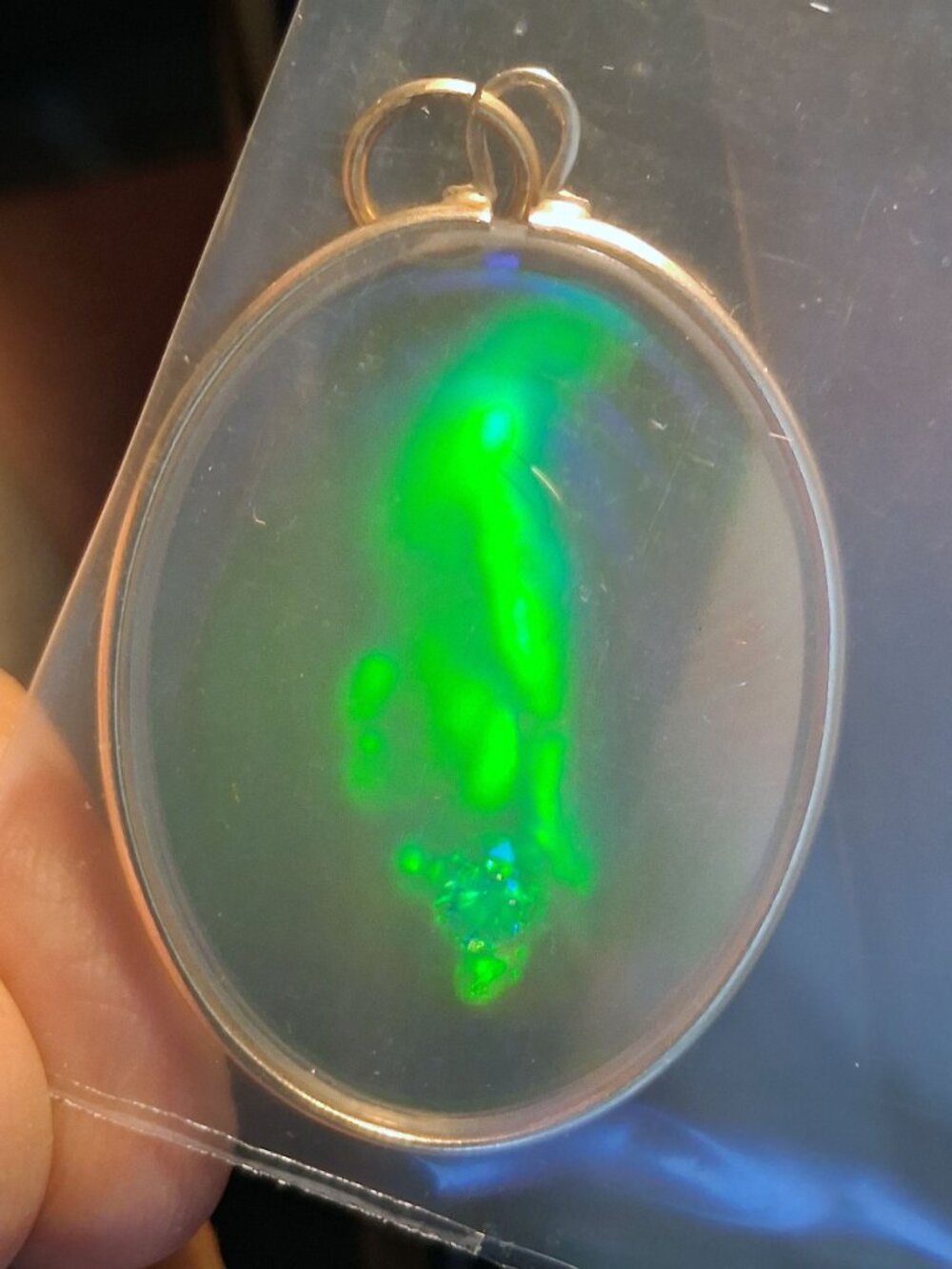 Hologram Pendant Hand Holding Gem